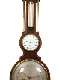 A Regency Crossbanded Mahogany Repeating Clock and Barometer
