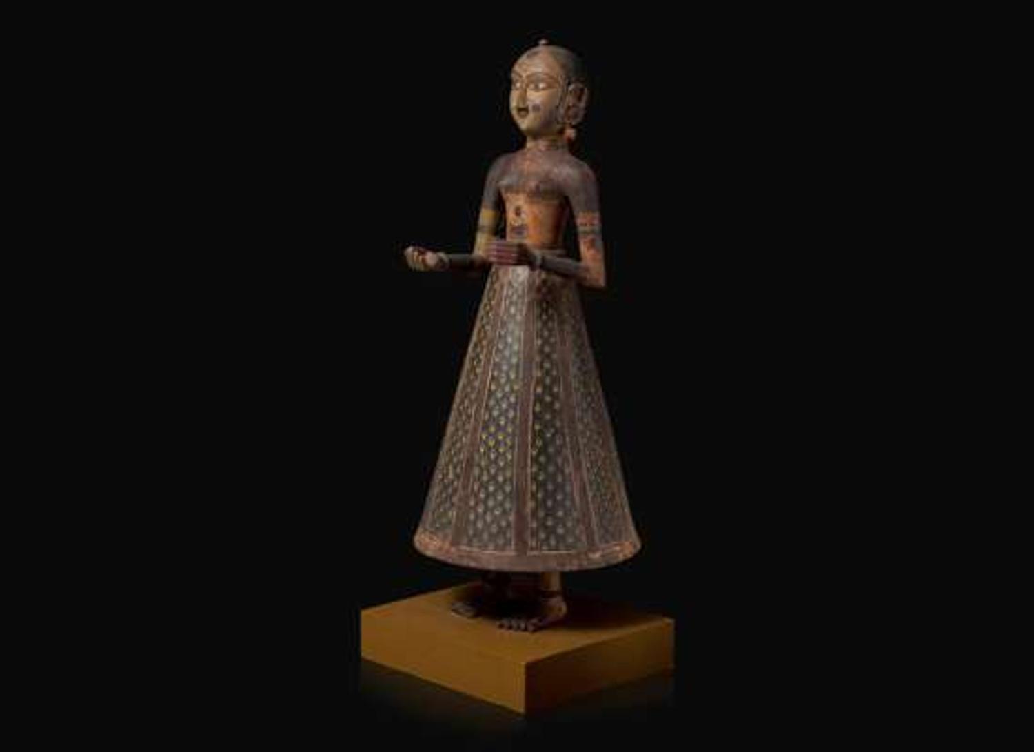 An Indian carved and painted wood Gauri figure, Rajasthan, 19th to early 20th century 印度女神祗木雕 拉賈斯坦邦 十九至二十世紀初