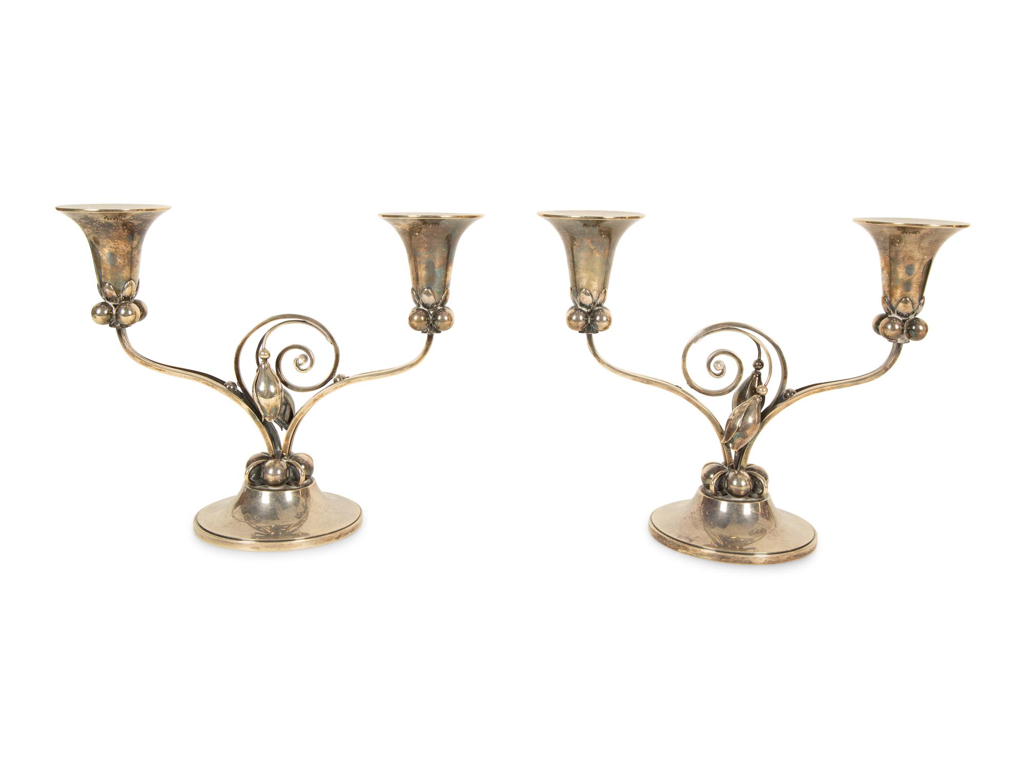 A Pair of Georg Jensen Silver Two-Light Candelabra