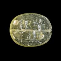 A Greek Glass Scaraboid with the God Dionysos Driving a Biga Chariot Pulled by Panthers