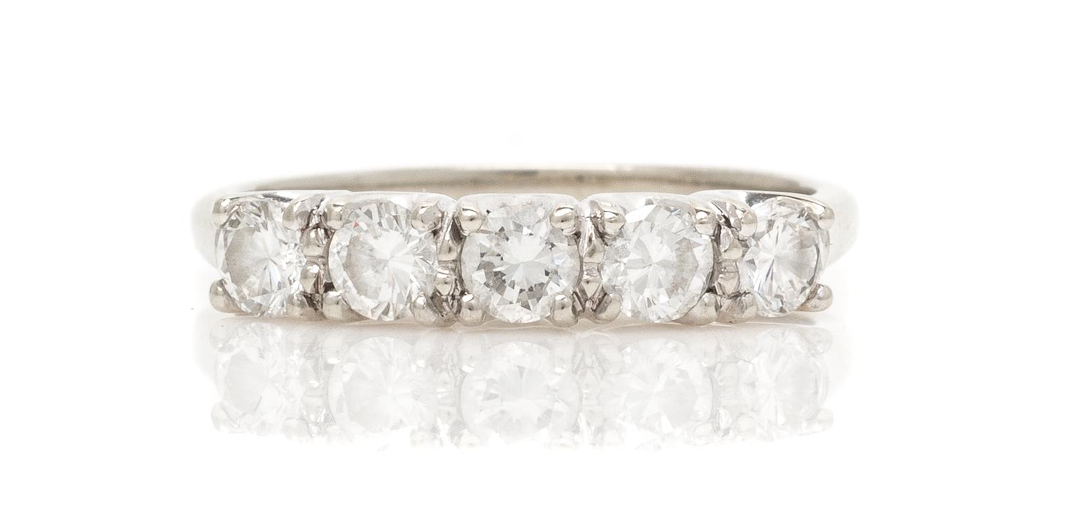 A 14 Karat White Gold and Diamond Band, 1.90 dwts.