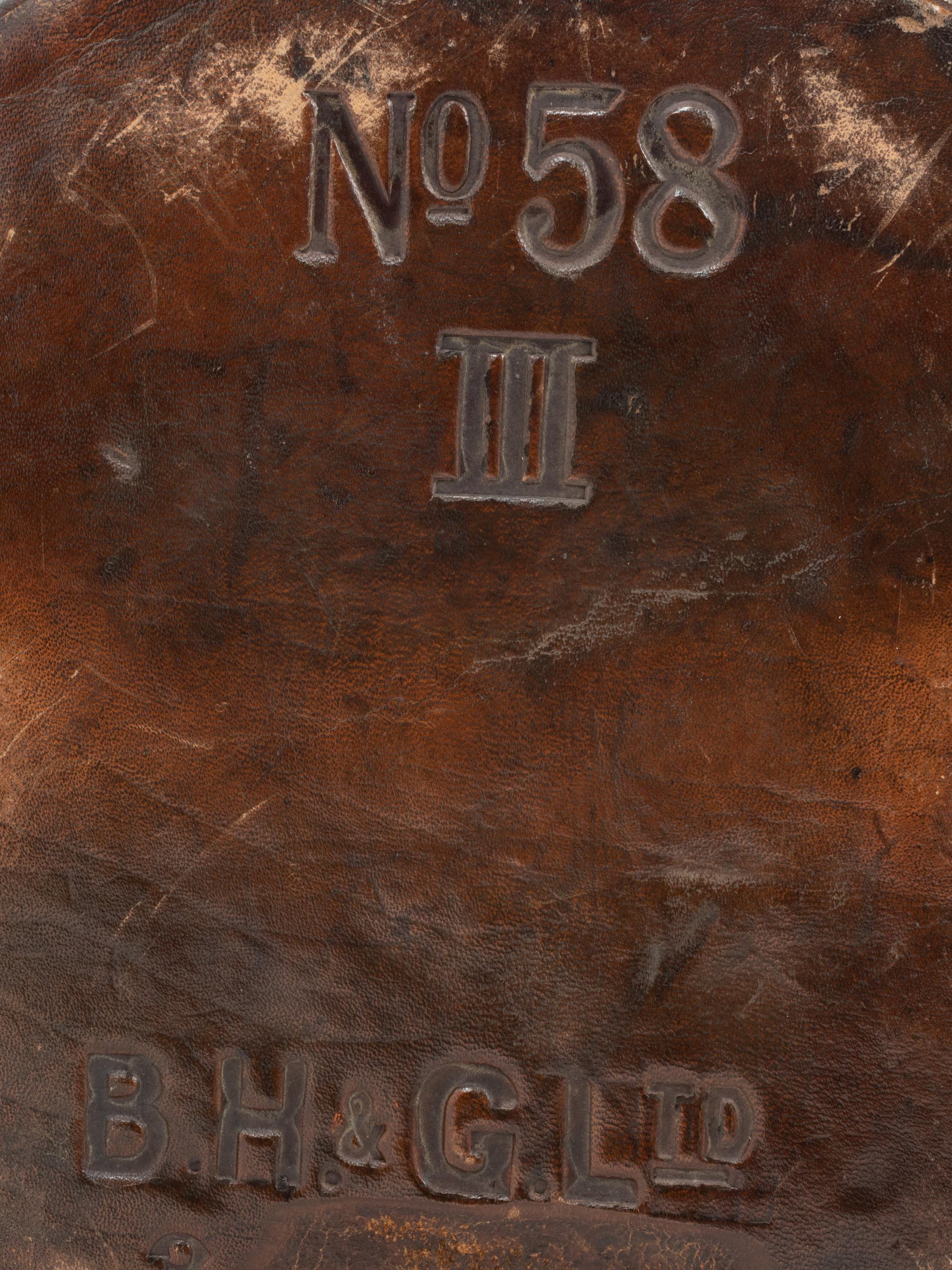 A WWI British Royal Navy Leather Artillery Bucket with an Associated American Indurated Fiber Liner