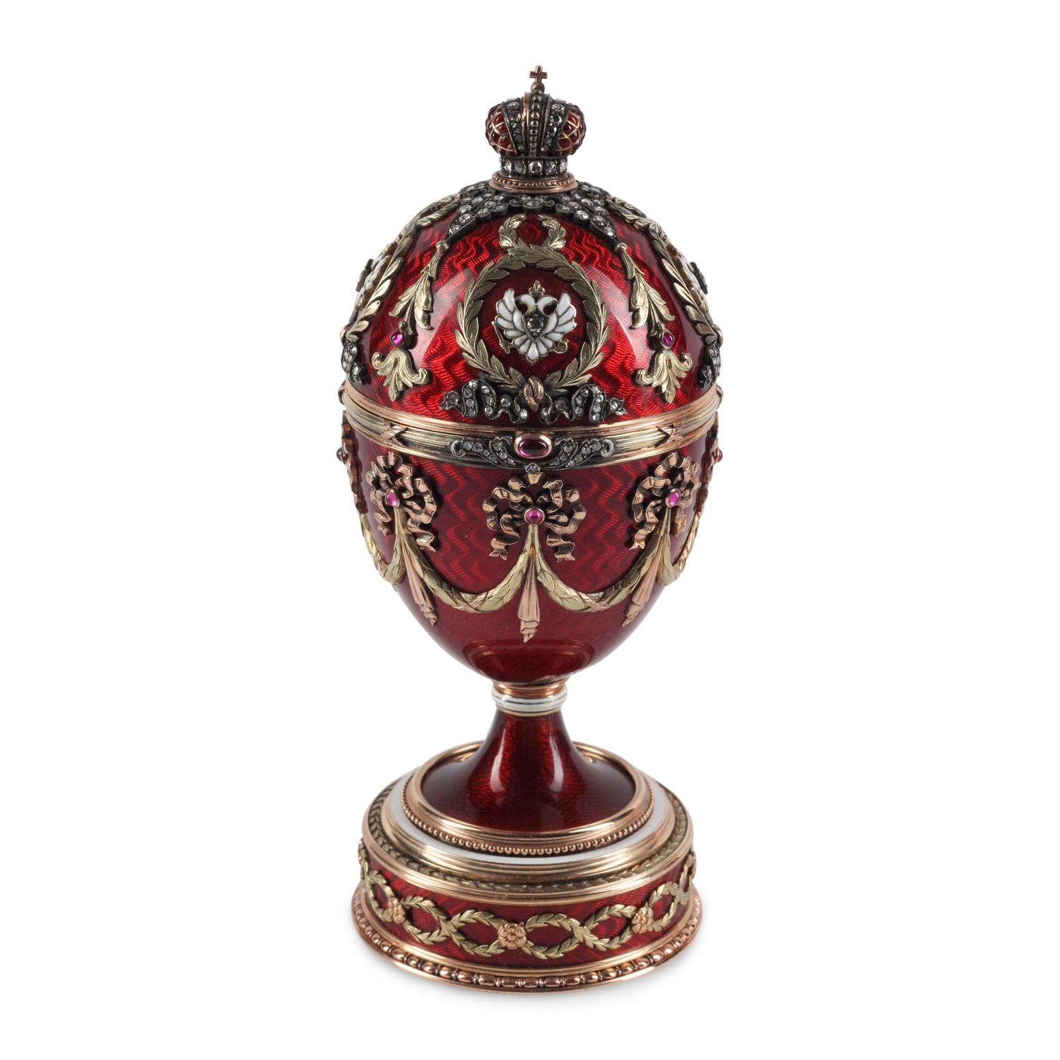 A 14-Karat Gold, Diamond, Gemstone and Guilloché Enamel Surprise Egg