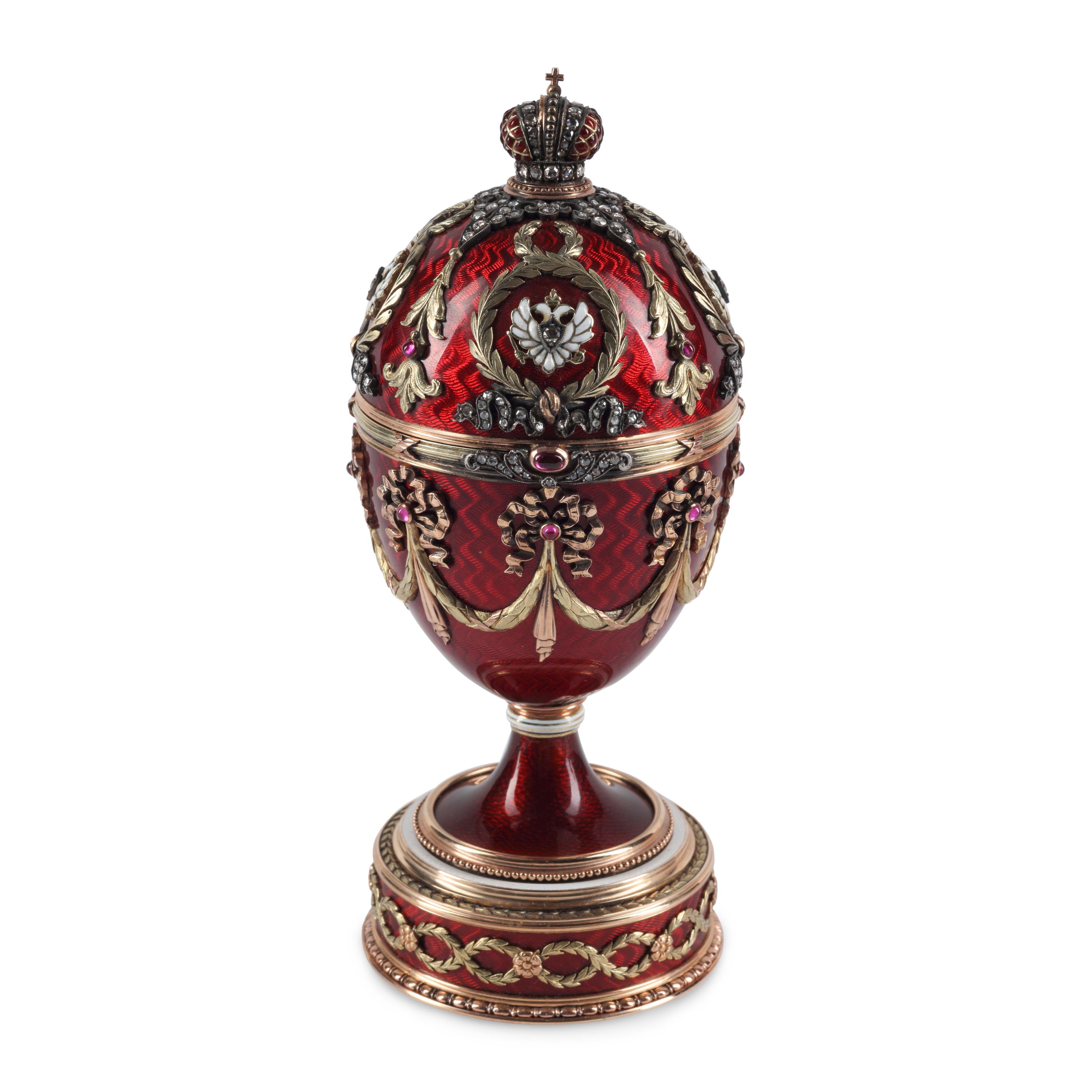 A 14-Karat Gold, Diamond, Gemstone and Guilloché Enamel Surprise Egg