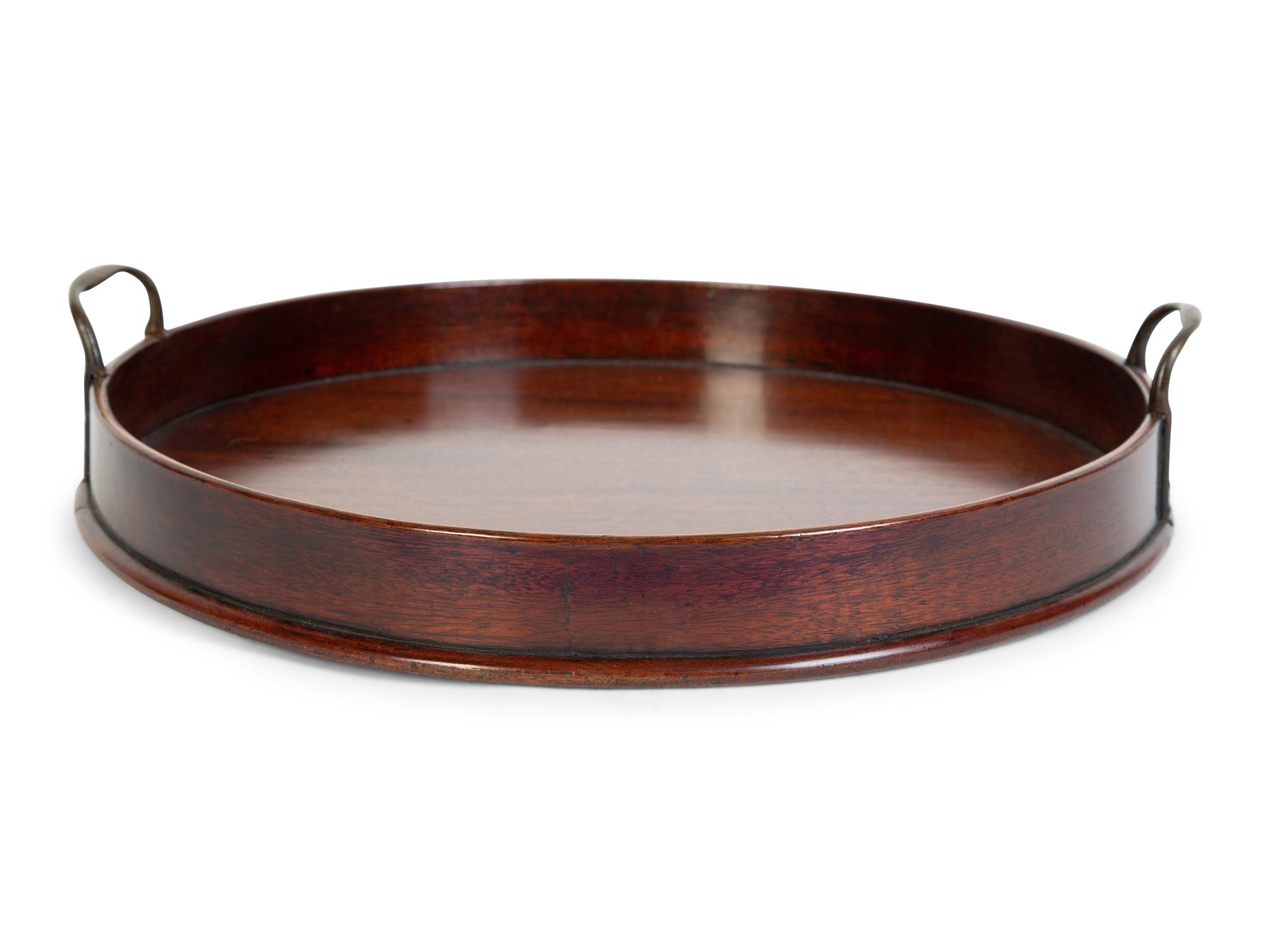 A Regency Mahogany Circular Serving Tray with Brass Handles — 19TH CENTURY