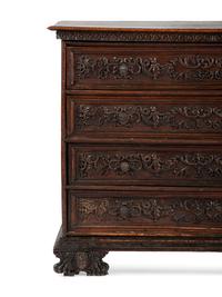 A Baroque Highly Carved Walnut Commode