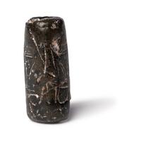 A Mesopotamian Black Steatite Cylinder Seal
