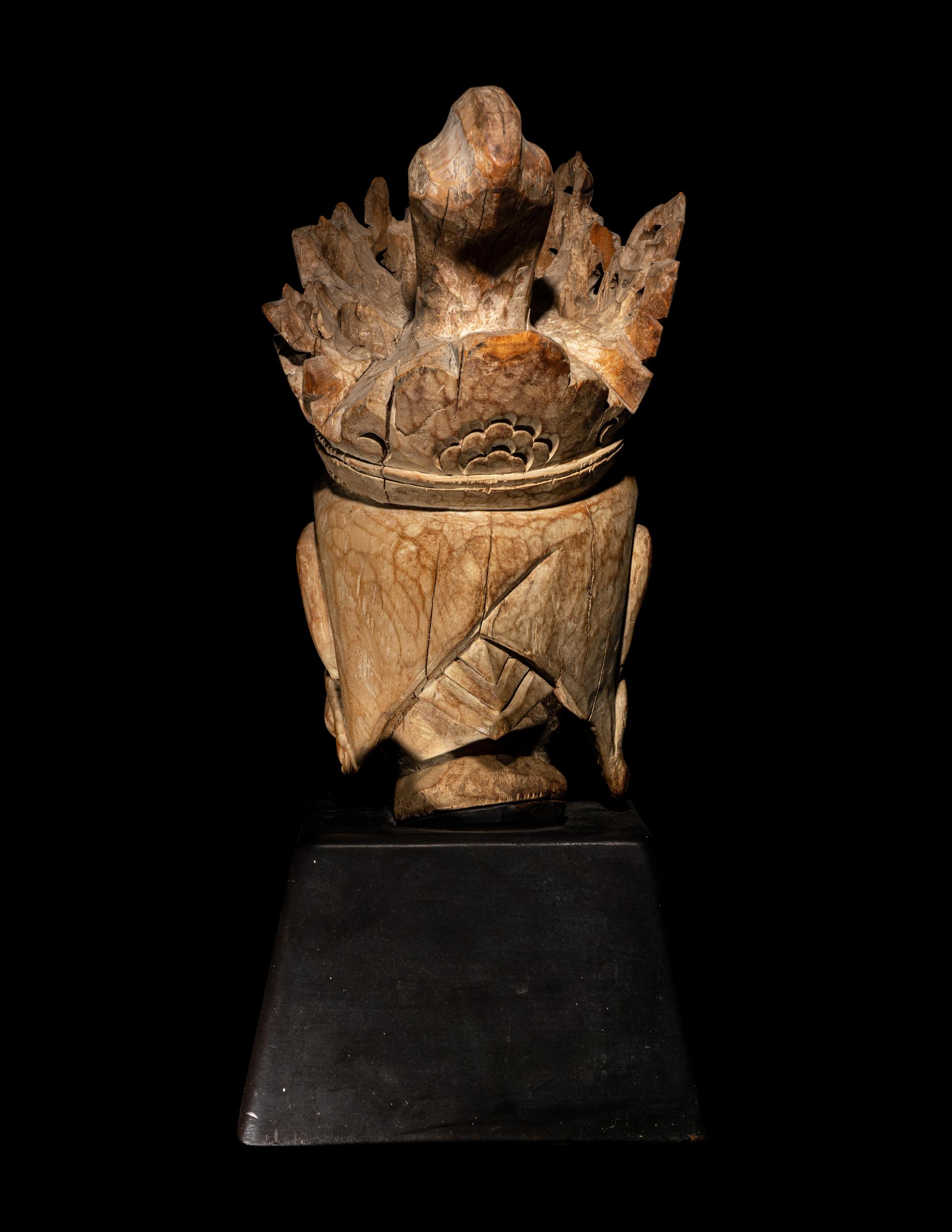 A Carved Wood Head of Guanyin