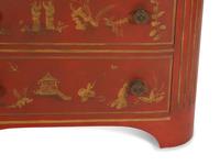 A Red and Gilt Chinoiserie Decorated Commode with Faux Marble Top