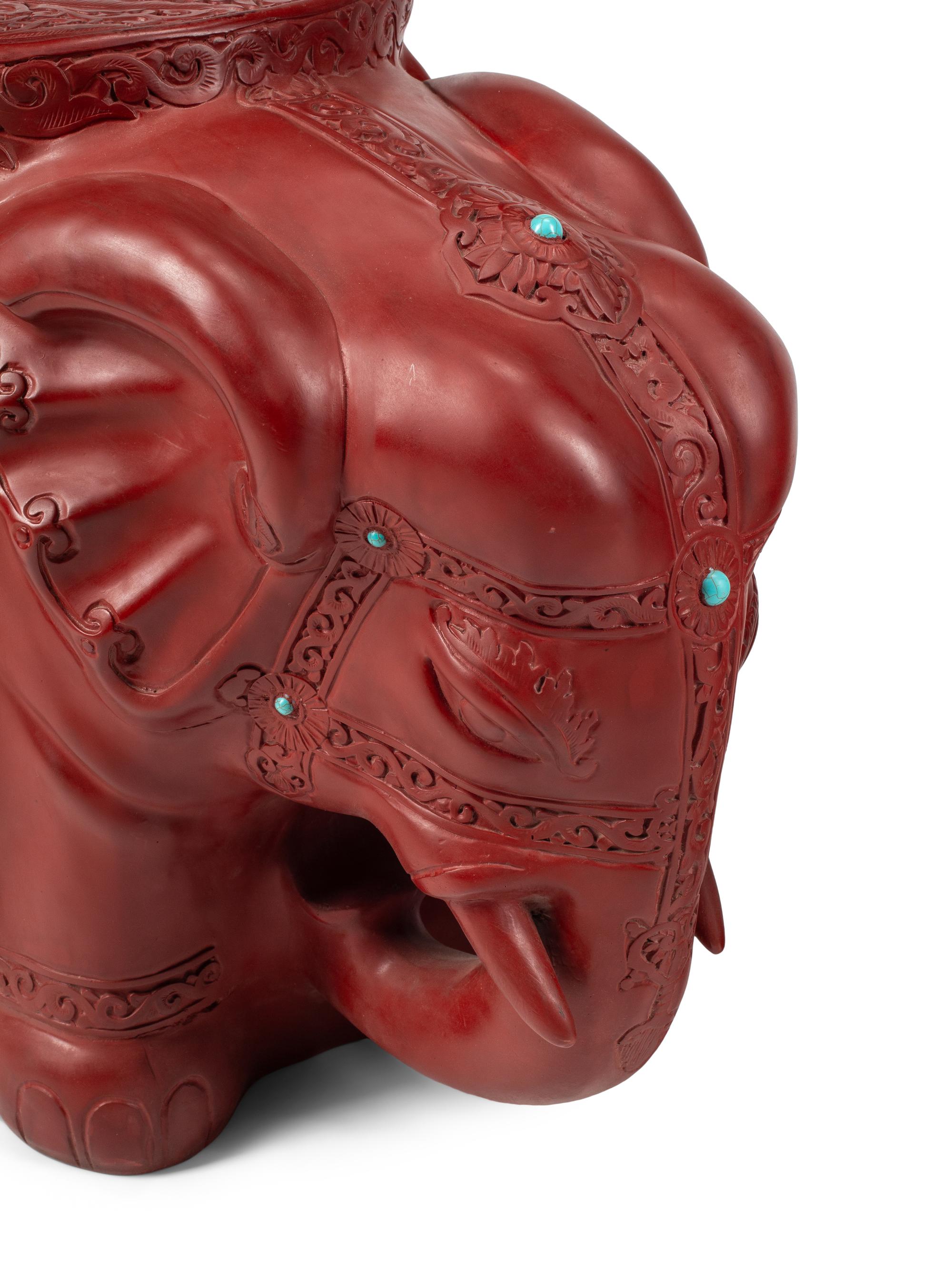 A Pair of Chinese Carved Red Lacquer and Turquoise Cabochon Elephant-Form Stools
