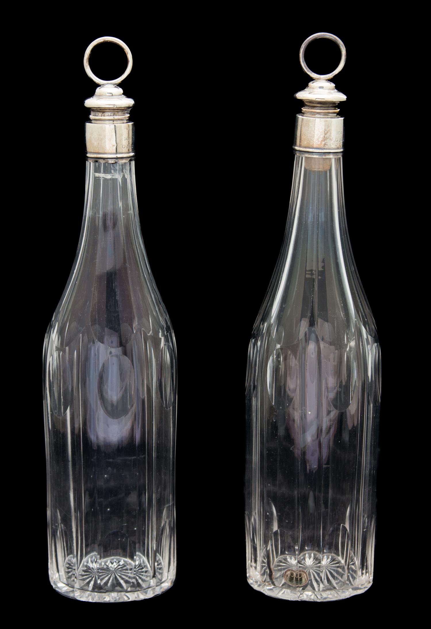 A Pair of English Silver Mounted Cut Glass Bottles Height 12 3/4 inches. — Birmingham, 1926