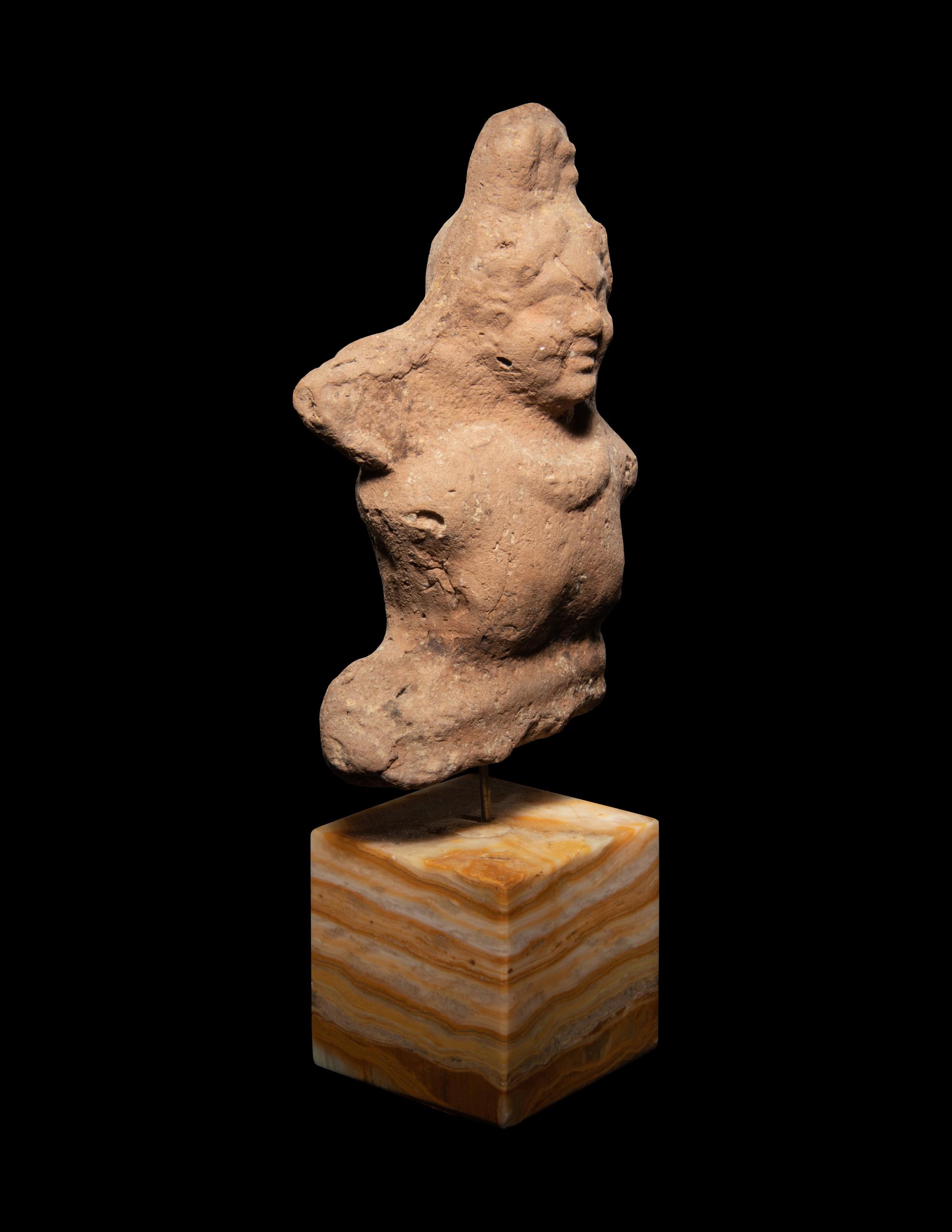 A Romano-Egyptian Terra Cotta Figure