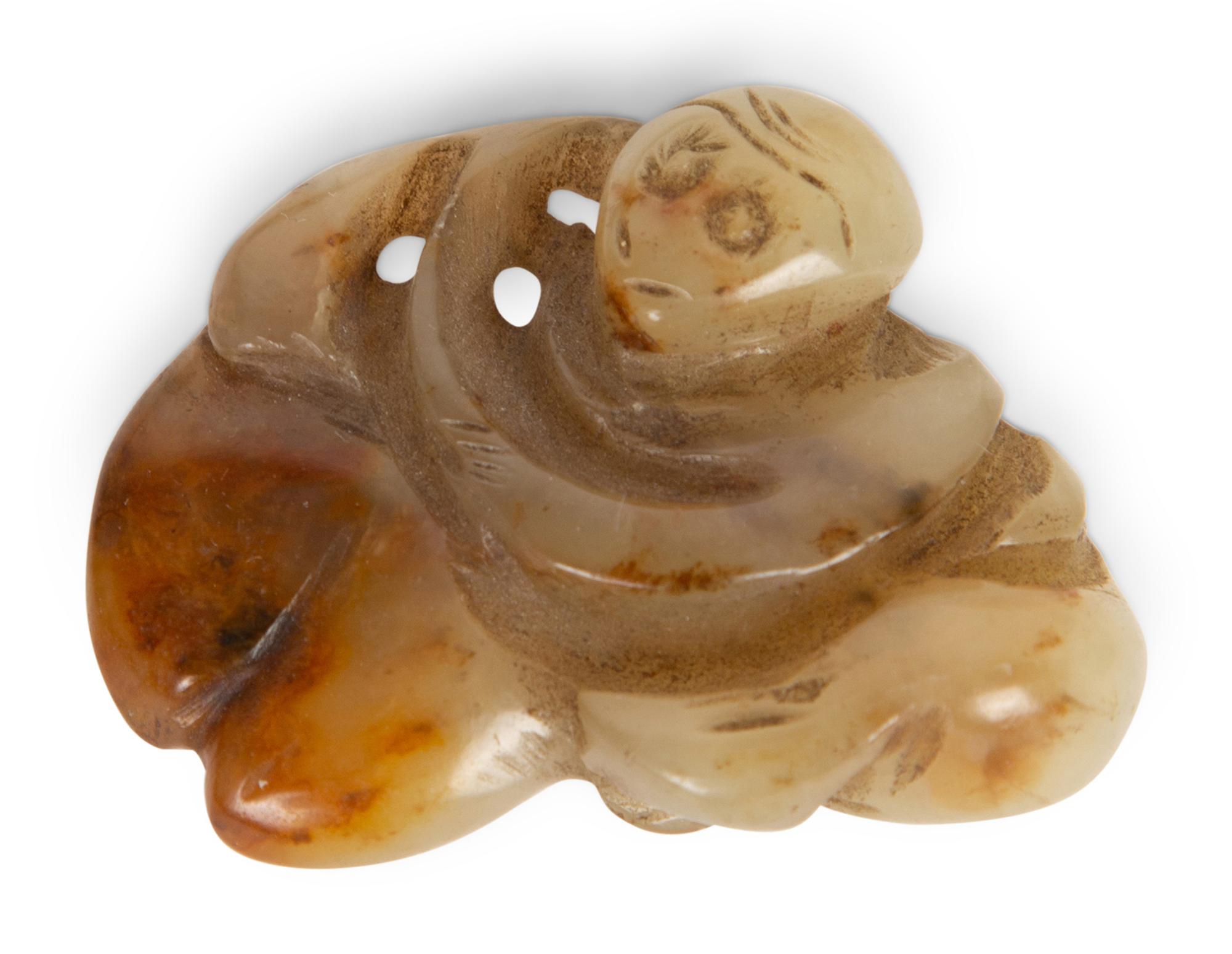 A Collection of Seven Carved Jadeite Figures — 20TH CENTURY
