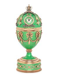 A Gold, Guilloché Enamel and Gemstone-Mounted Surprise Egg