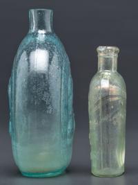 A Washington-Taylor Portrait Flask and South Carolina Dispensary Flask
