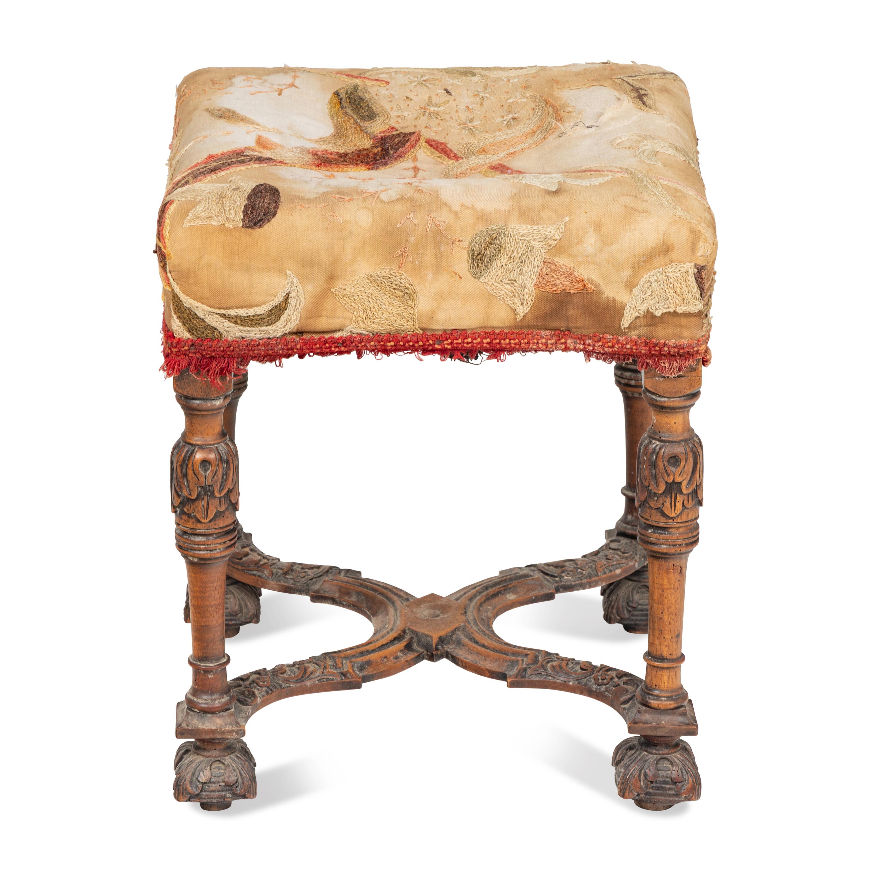 A Continental Carved Walnut Stool