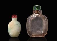 A Chinese carved smoky quartz snuff bottle and a jadeite snuff bottle 煙晶石及翡翠鼻煙壺各一只
