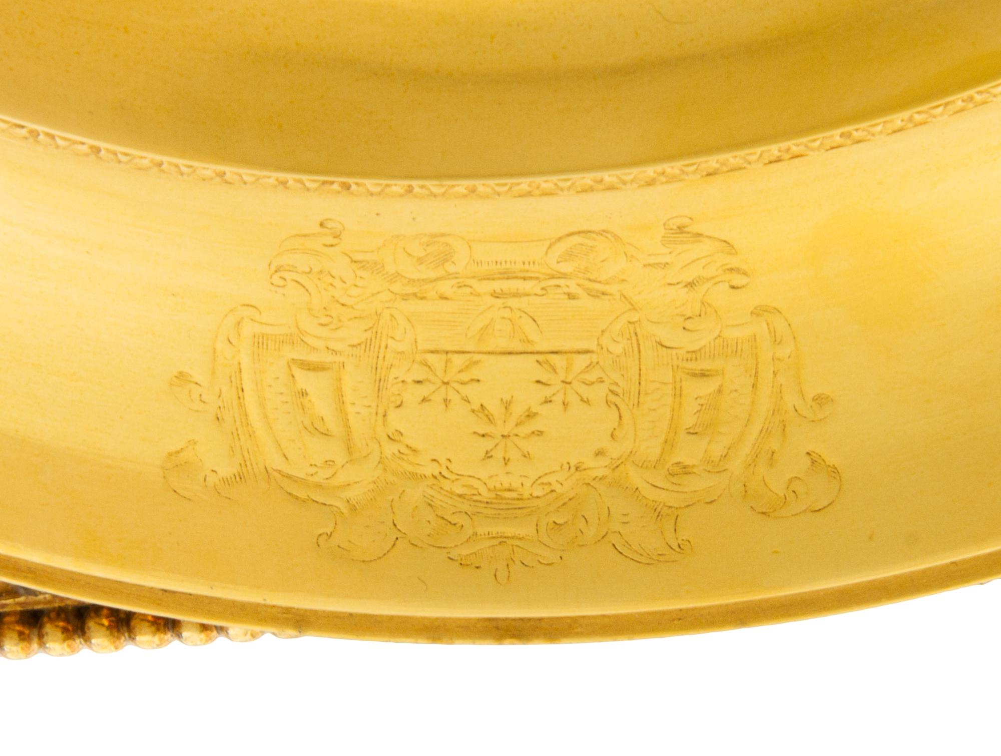 A George III Silver-Gilt Tureen, Benjamin Smith II & Benjamin Smith III, London, 1817, modeled after the Warwick vase, the lid with a l