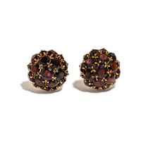 A COLLECTION OF YELLOW GOLD AND GARNET JEWELRY