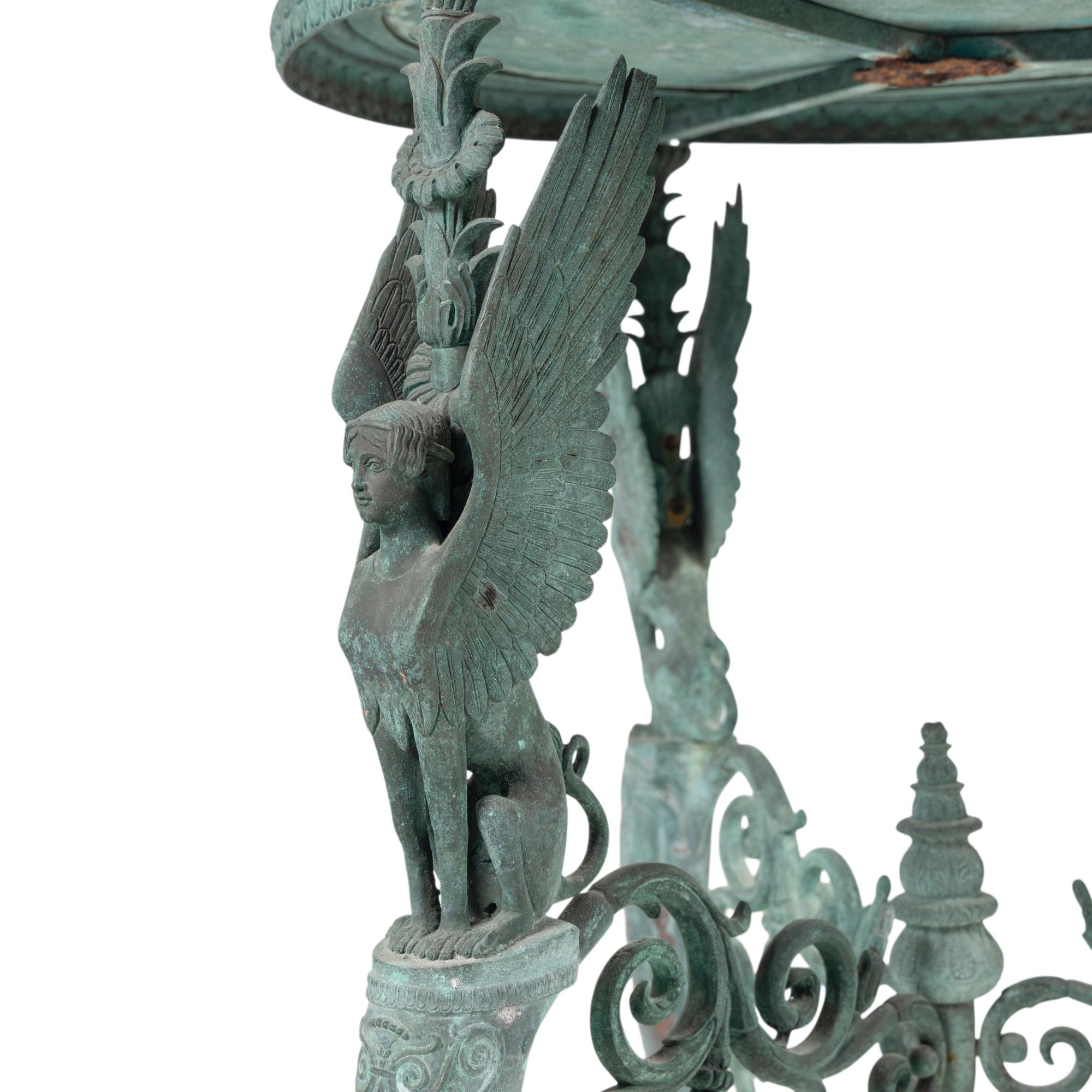 An Italian Green Patinated Bronze Tripod Athénienne