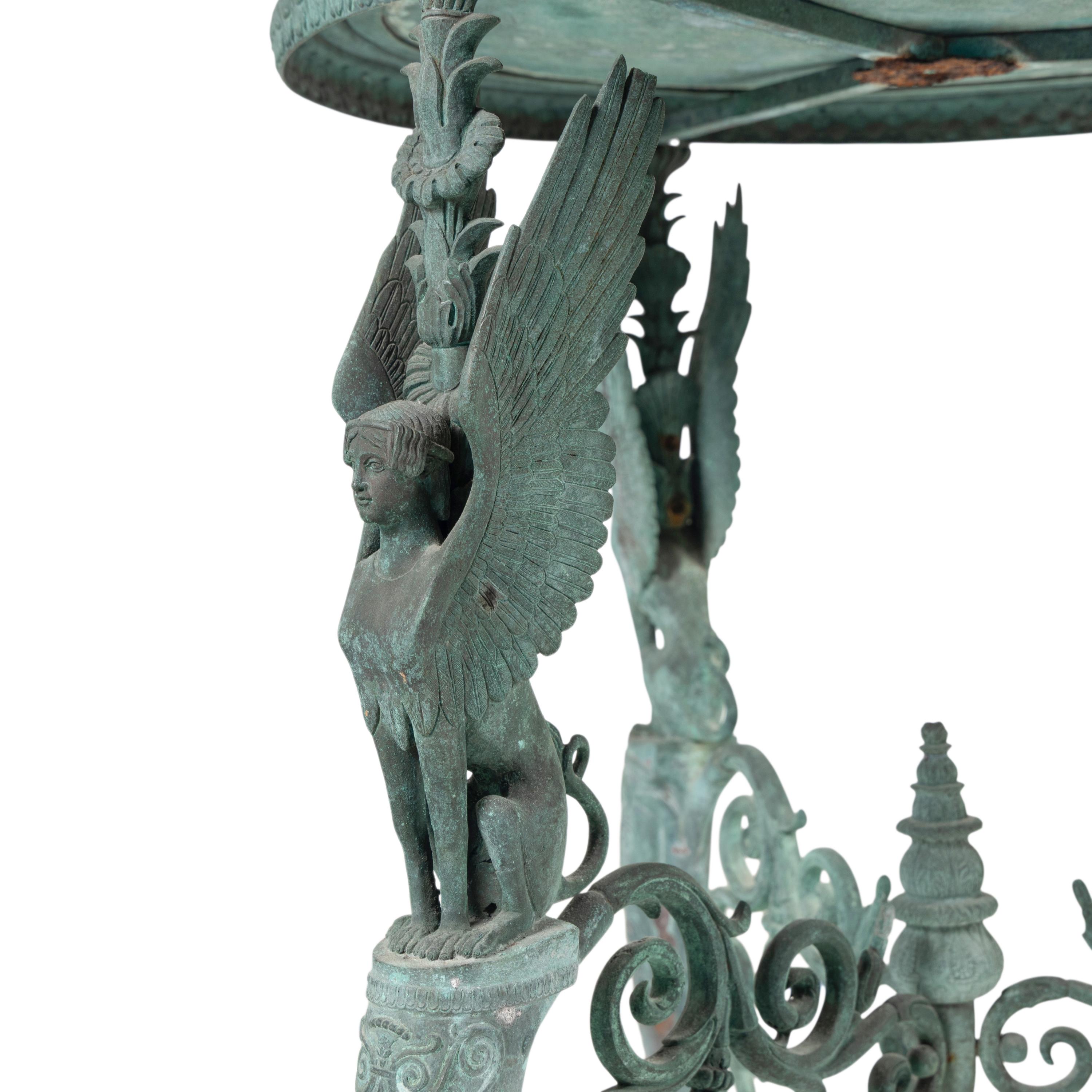 An Italian Green Patinated Bronze Tripod Athénienne