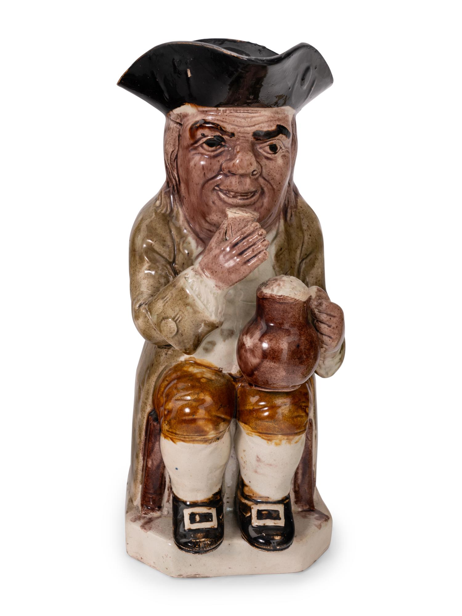 A Collection of Seven Ceramic Toby Mugs