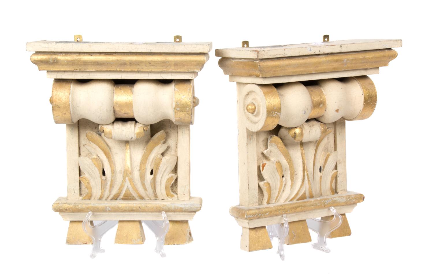 A Pair of Neoclassical Painted and Parcel Gilt Wall Brackets Height 13 inches. — 20TH CENTURY