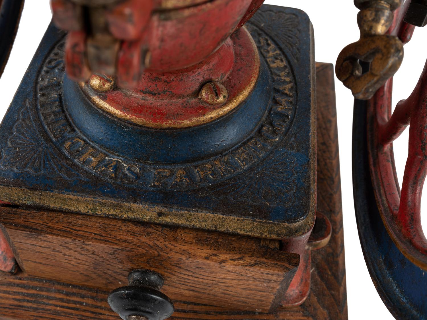 A Charles Parker No. 3000 Painted and Parcel Gilt Double-Wheeled Cast Iron Coffee Mill