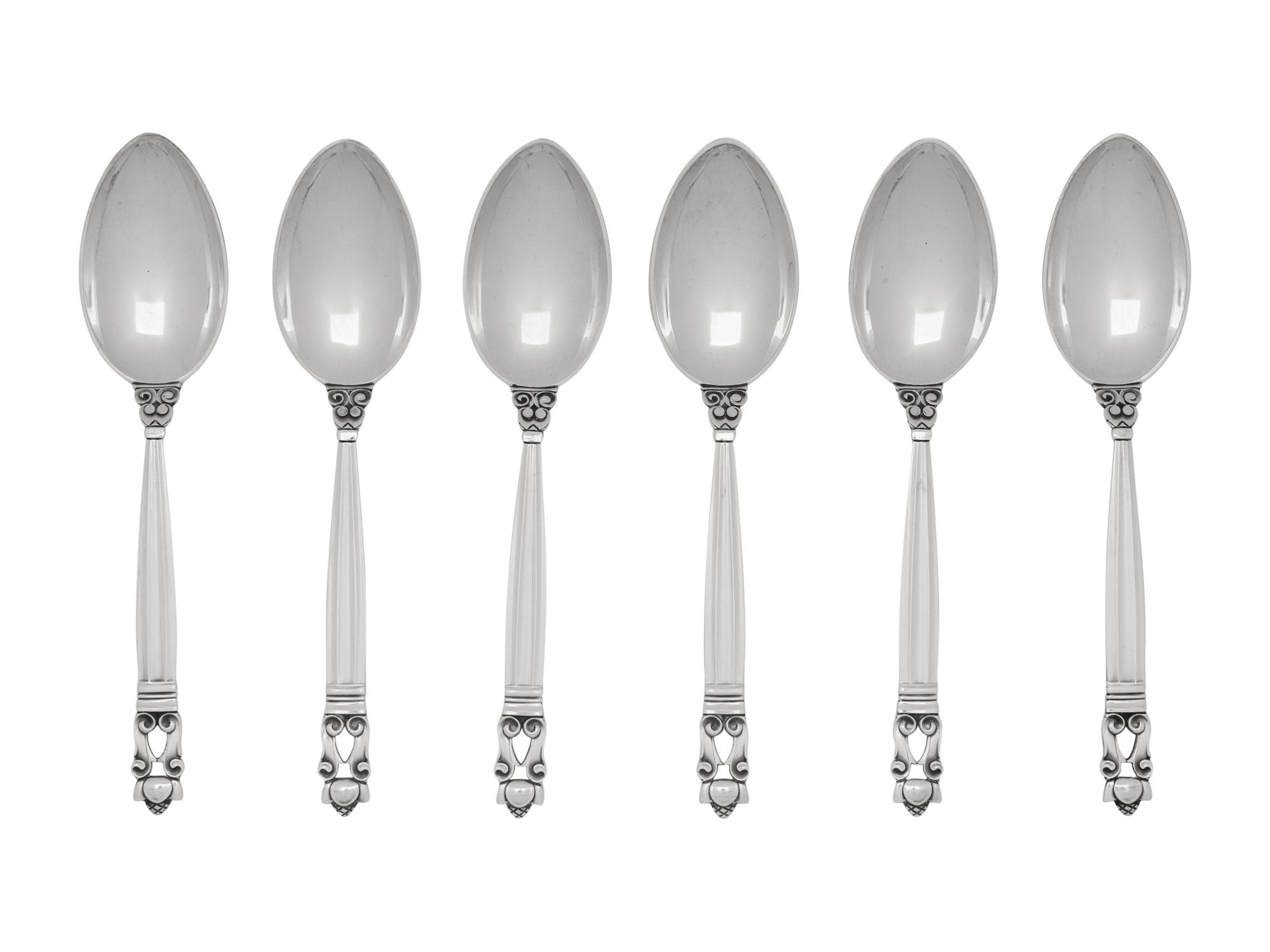 A Set of Six Georg Jensen Acorn Silver Dessert Spoons