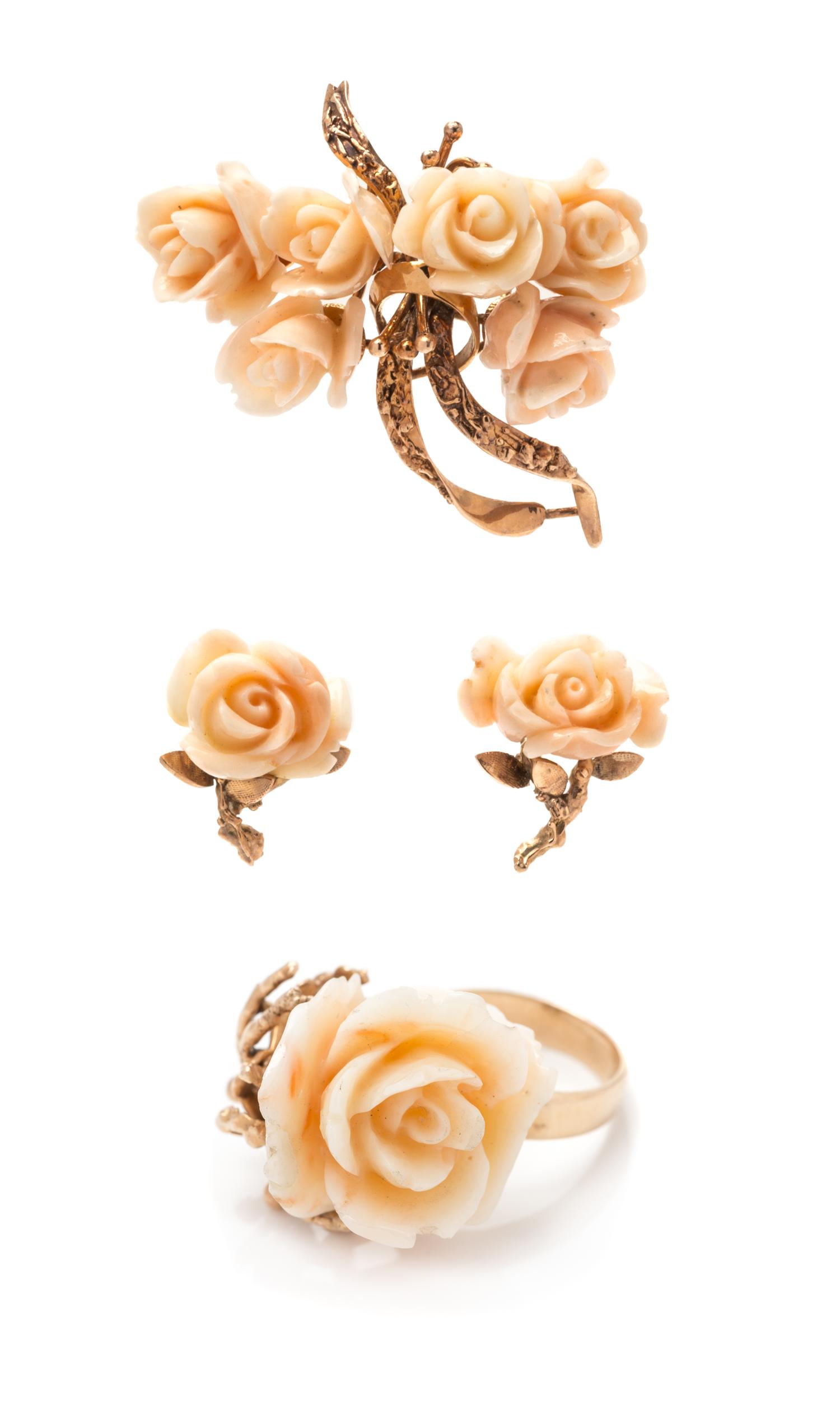 A Collection of 18 Karat Rose Gold and Angel Skin Coral Rose Motif Jewelry, 25.00 dwts.