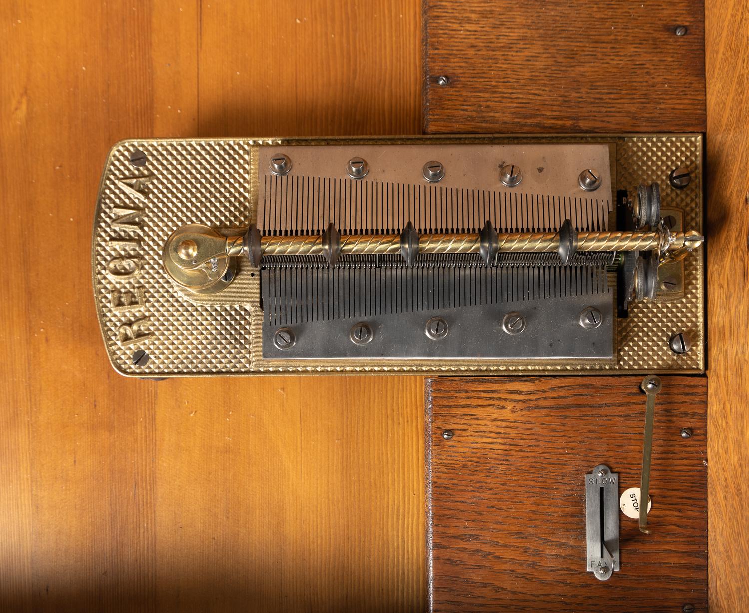 A Regina Style 26 Table Disk Music Box