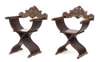 A Pair of Italian Walnut Savonarola Chairs Height 36 inches. — 20TH CENTURY