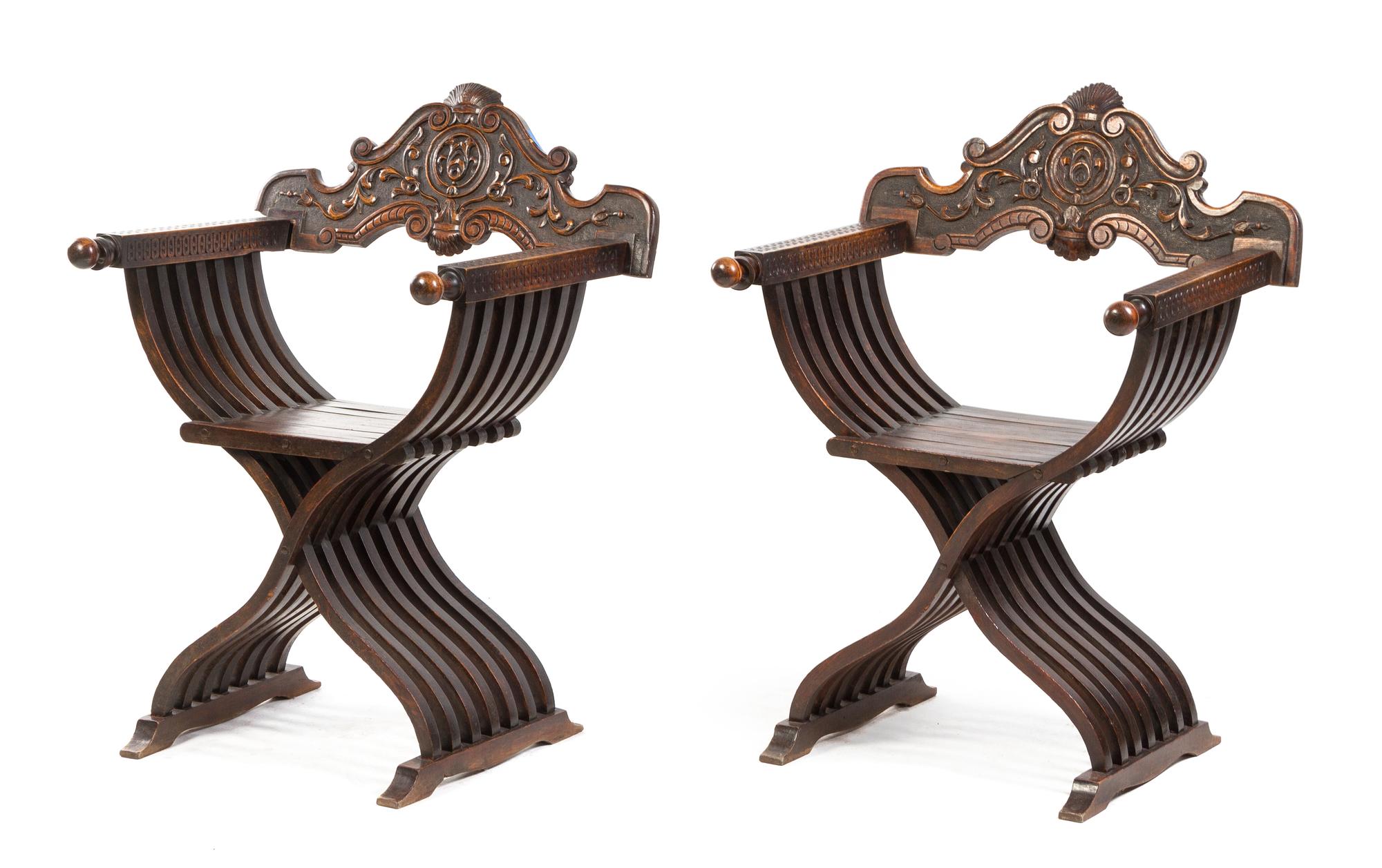 A Pair of Italian Walnut Savonarola Chairs Height 36 inches. — 20TH CENTURY
