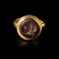 A Roman Carnelian Ring Stone with a Female Portrait Head — Set in a modern gold ring