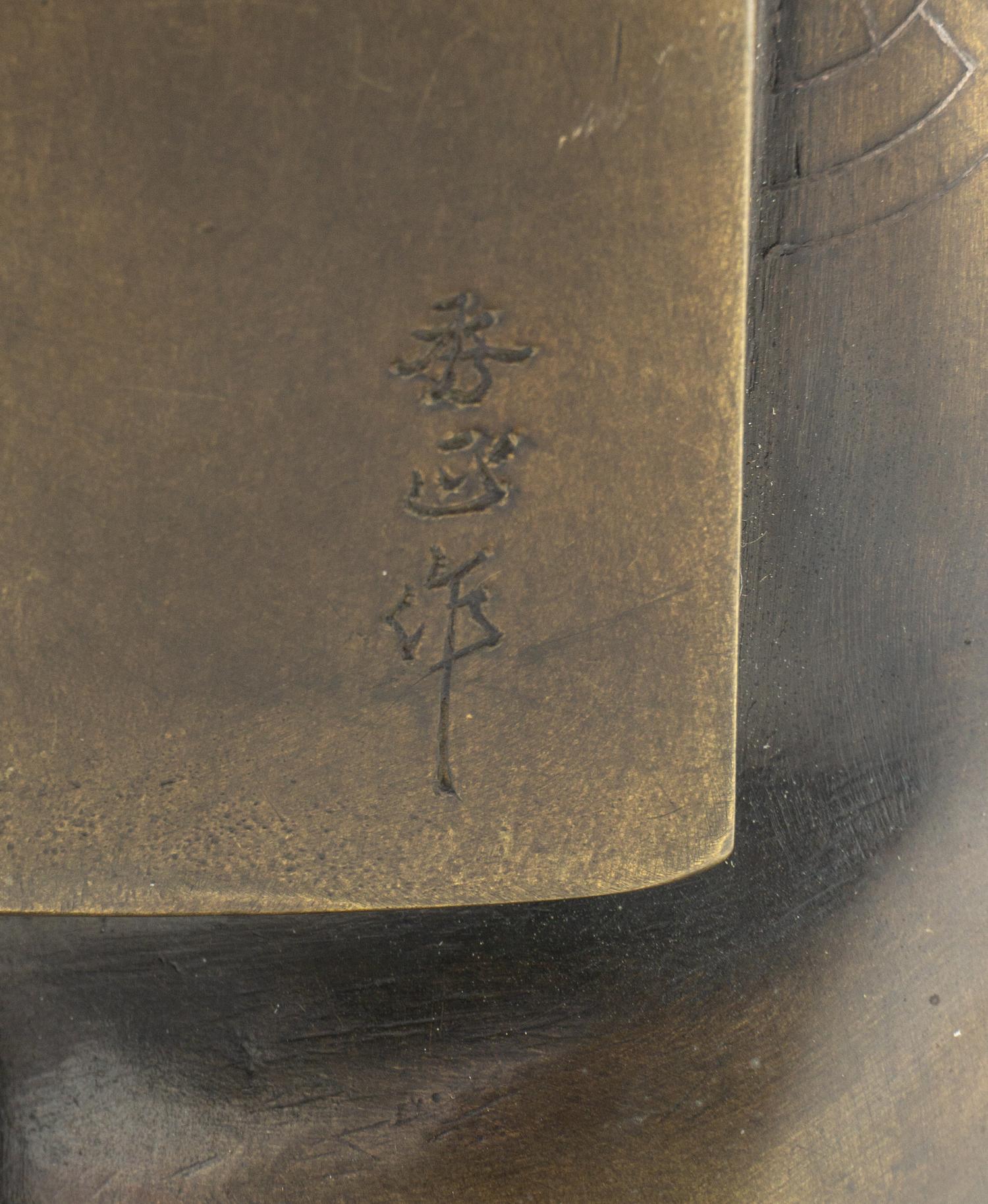A Japanese Bronze Figure