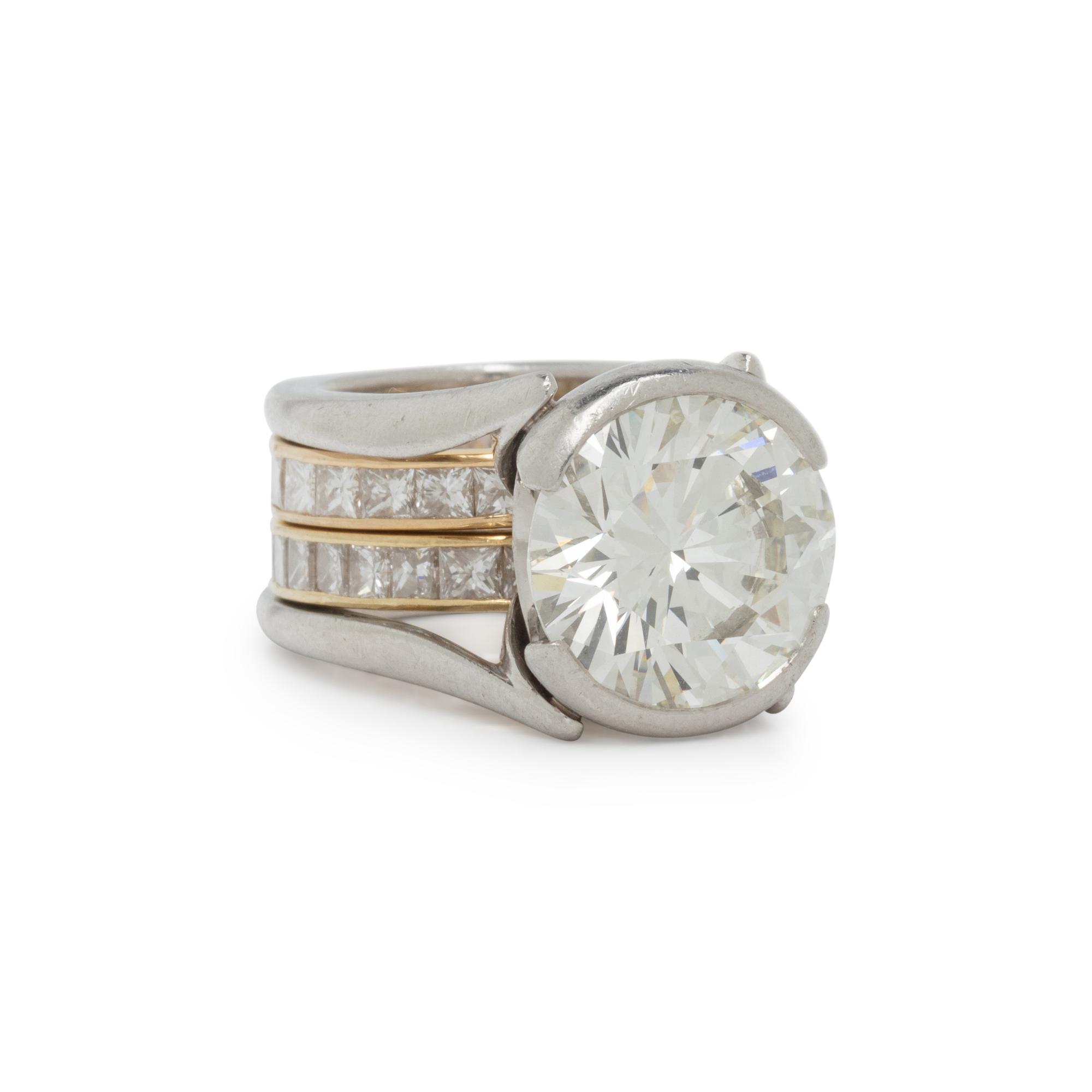 DIAMOND AND PLATINUM RING WITH PAIR OF ETERNITY BANDS