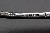 Eleven American Marine Decorated Silver Spoons