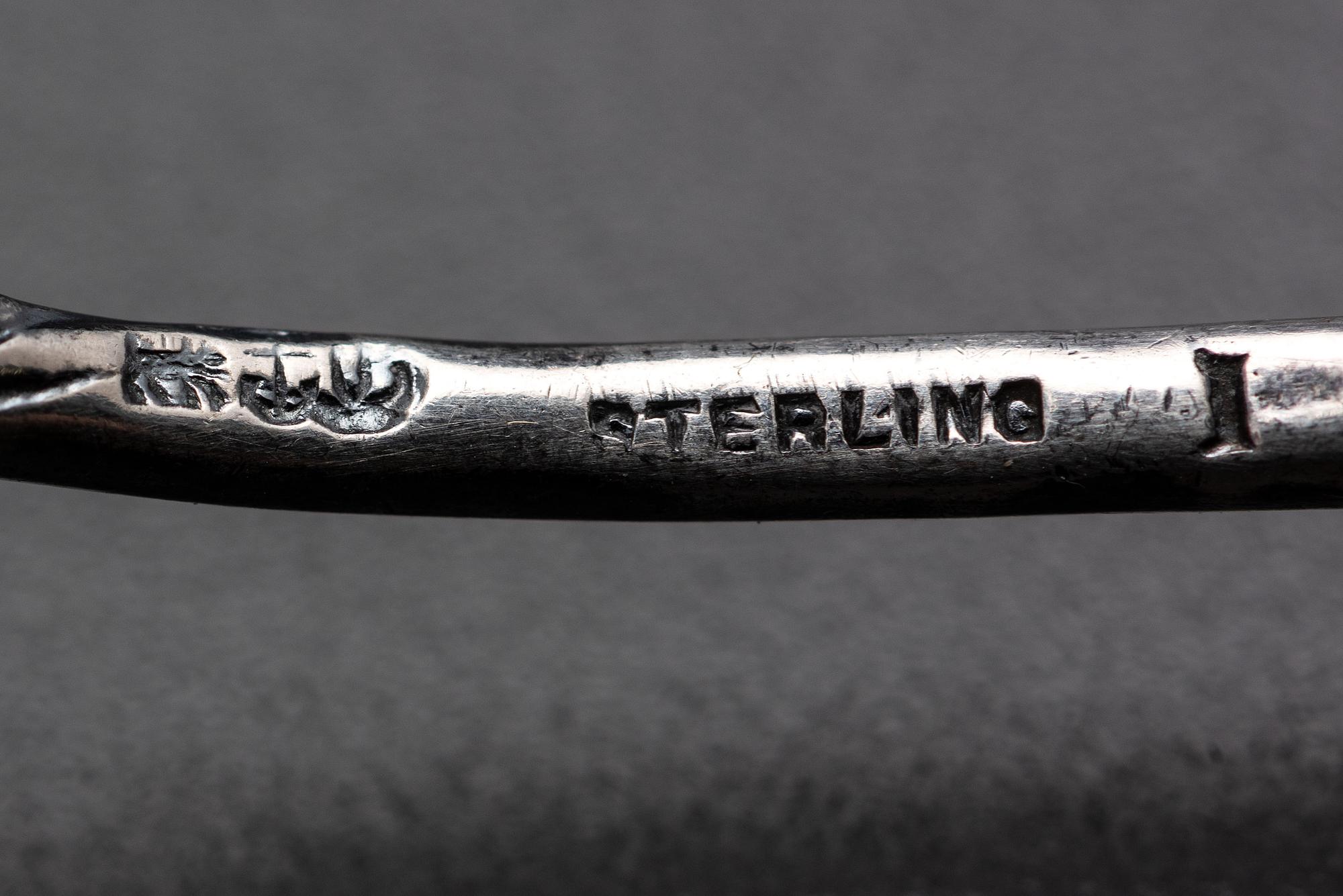 Eleven American Marine Decorated Silver Spoons