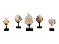 Five Glazed Earthenware Deity Heads