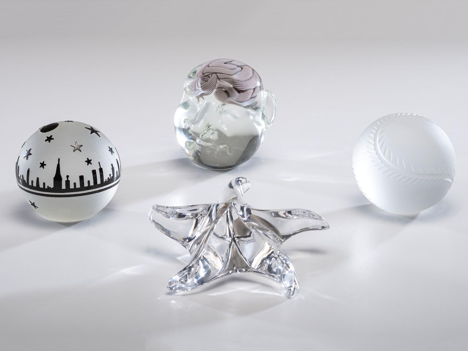 Four Glass Paperweights