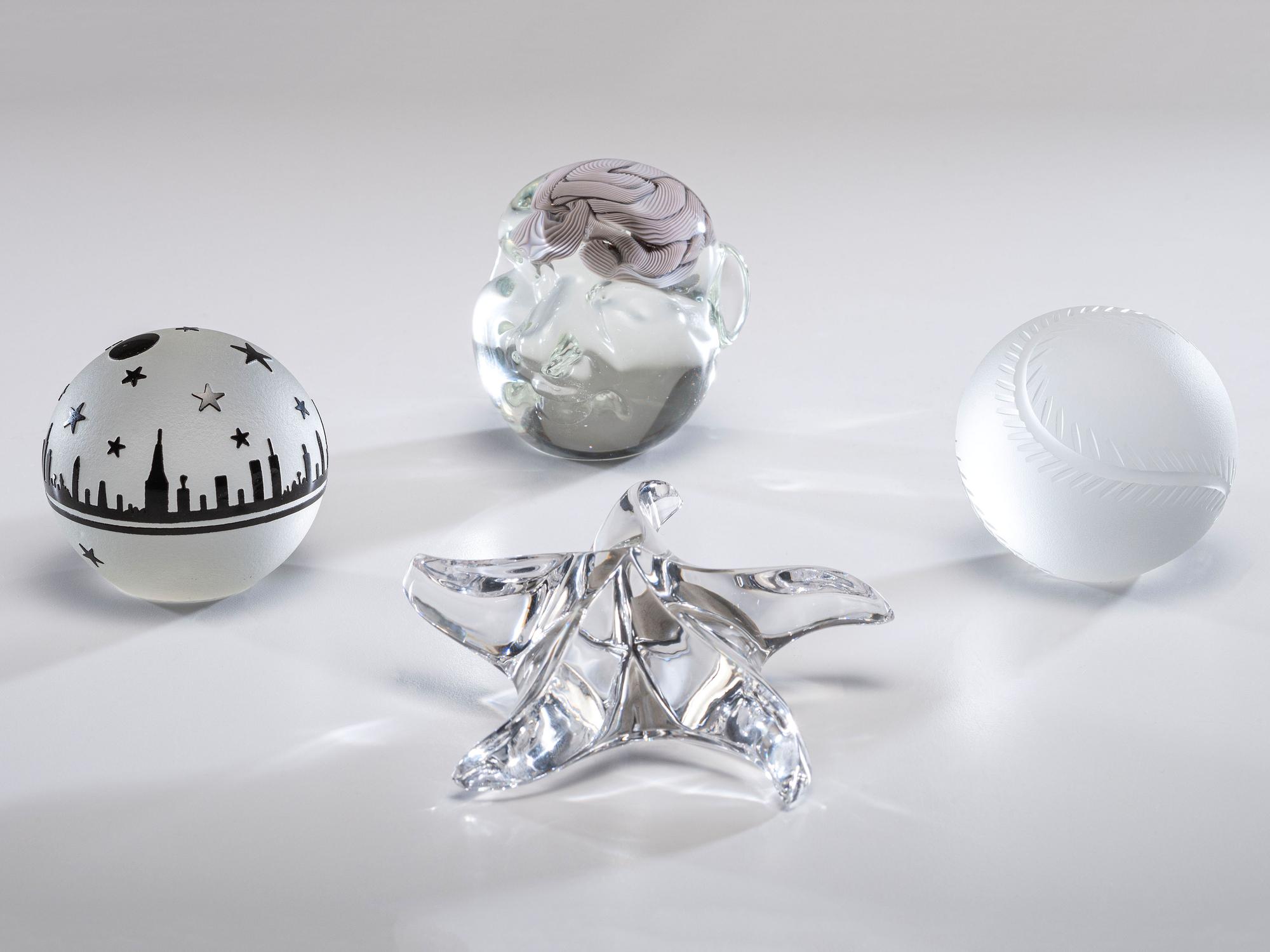 Four Glass Paperweights