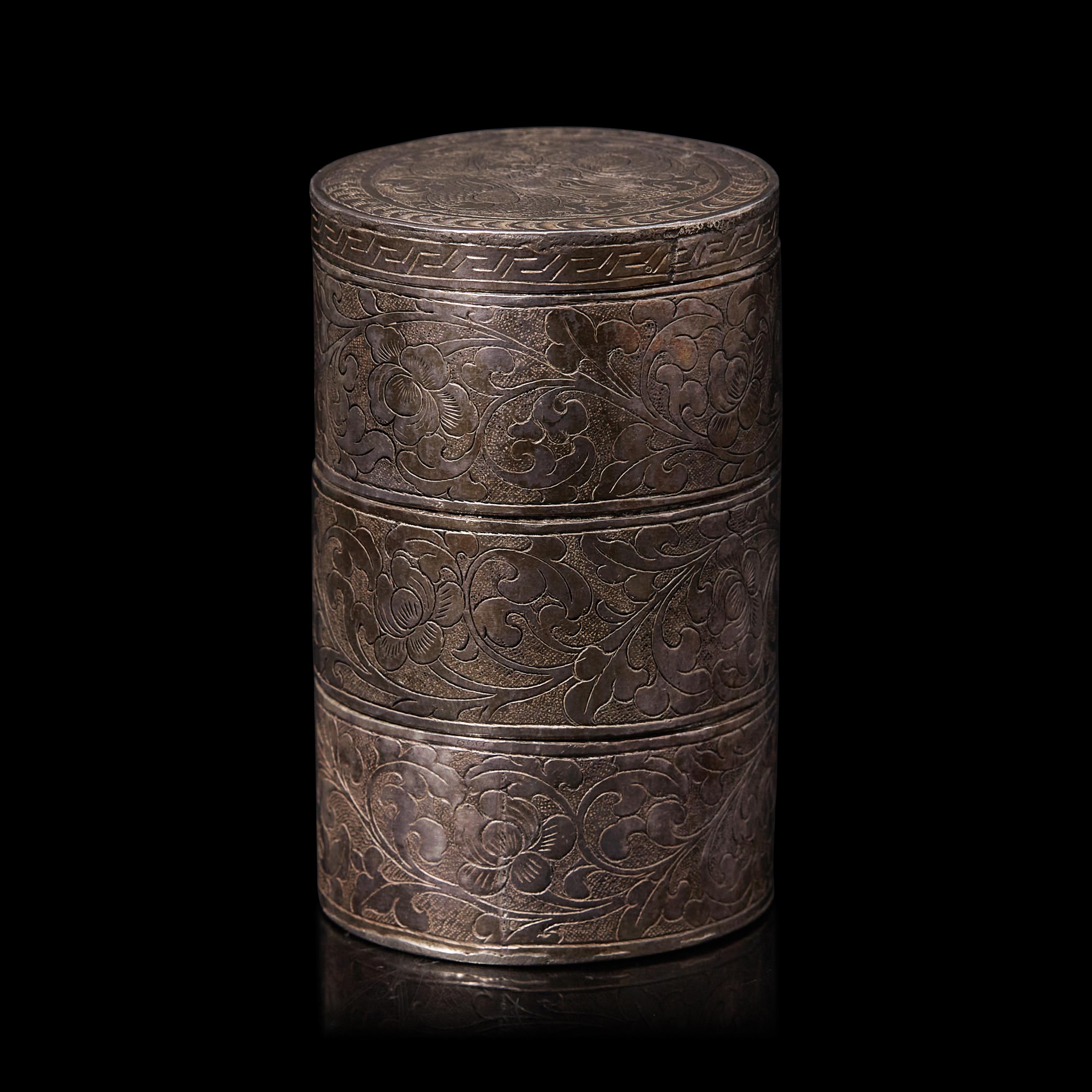 A Small Chinese Silver Tiered Box, Late Qing Dynasty 清晚期 銀鏨花套盒