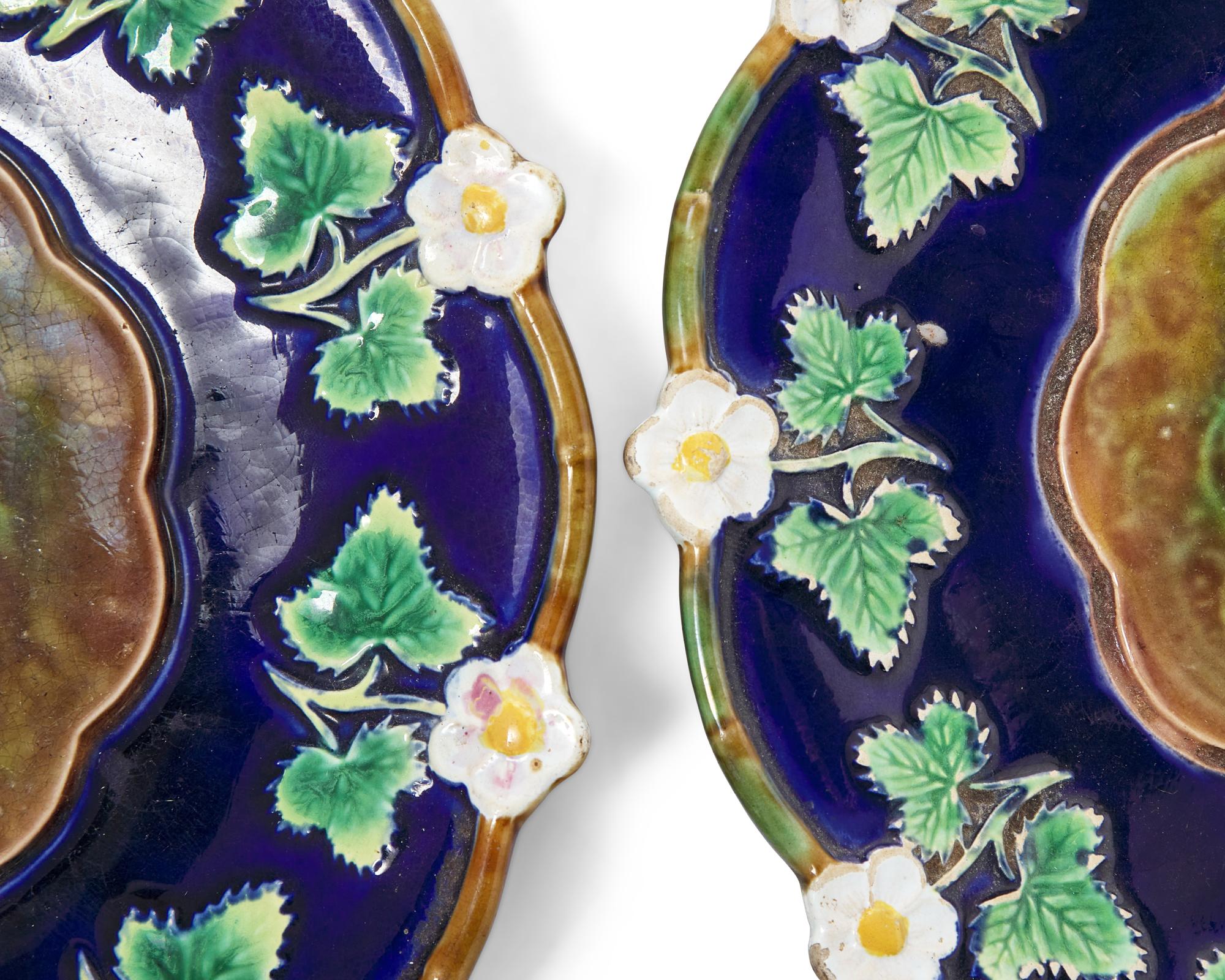 A Set of Six English "Strawberry Blossom" Majolica Plates with Cobalt Ground