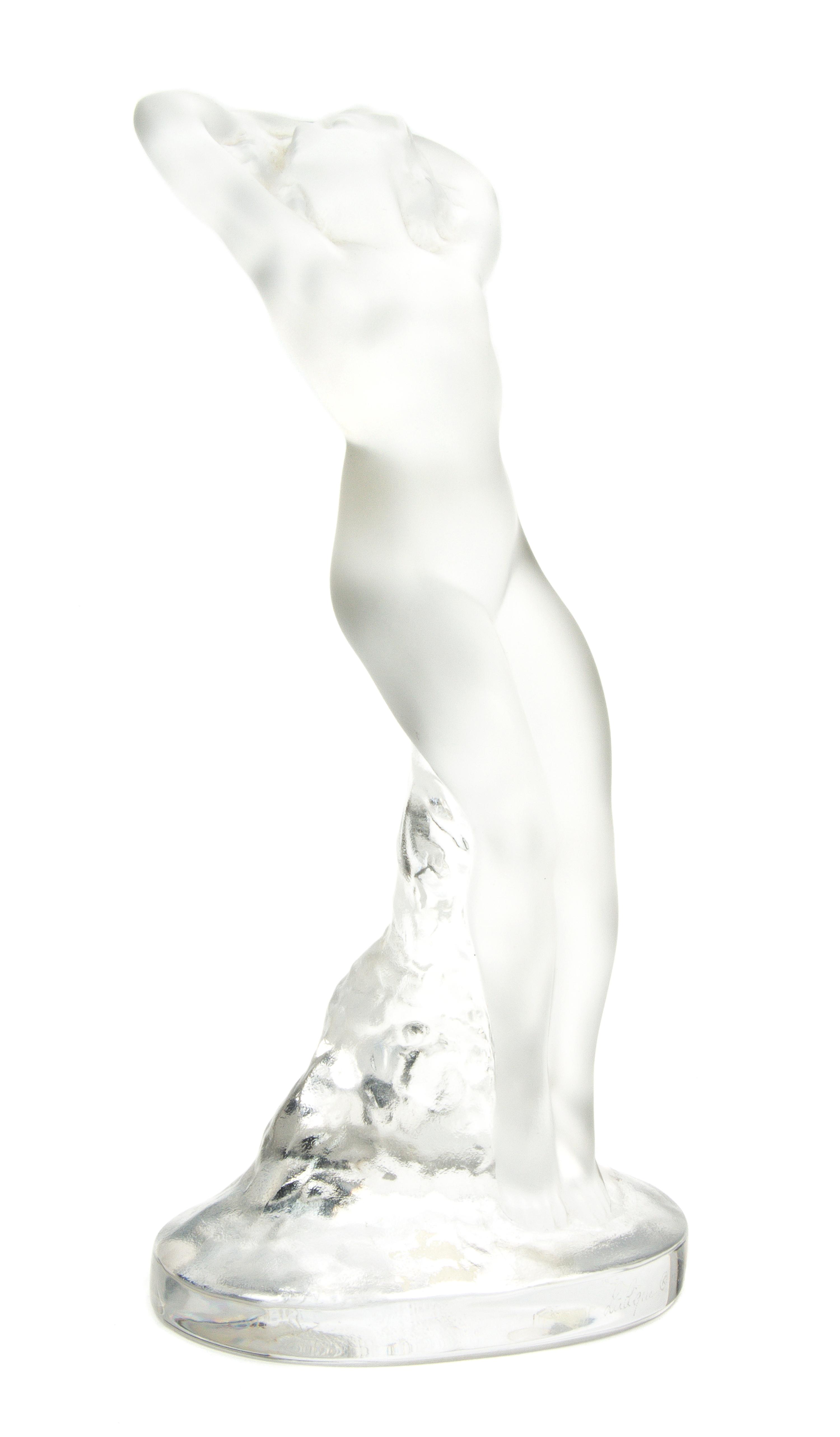 A Lalique Molded and Frosted Glass Figure, Height 9 1/4 inches.