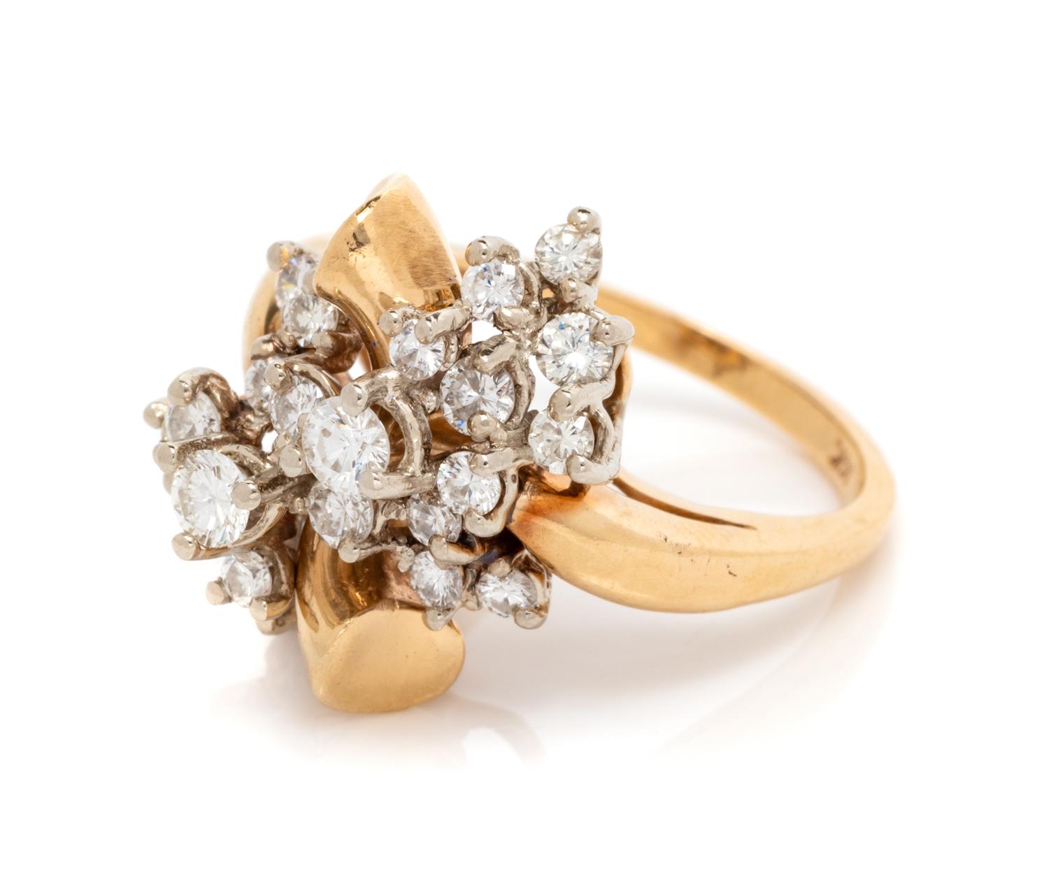 A 14 Karat Bicolor Gold and Diamond Ring,
