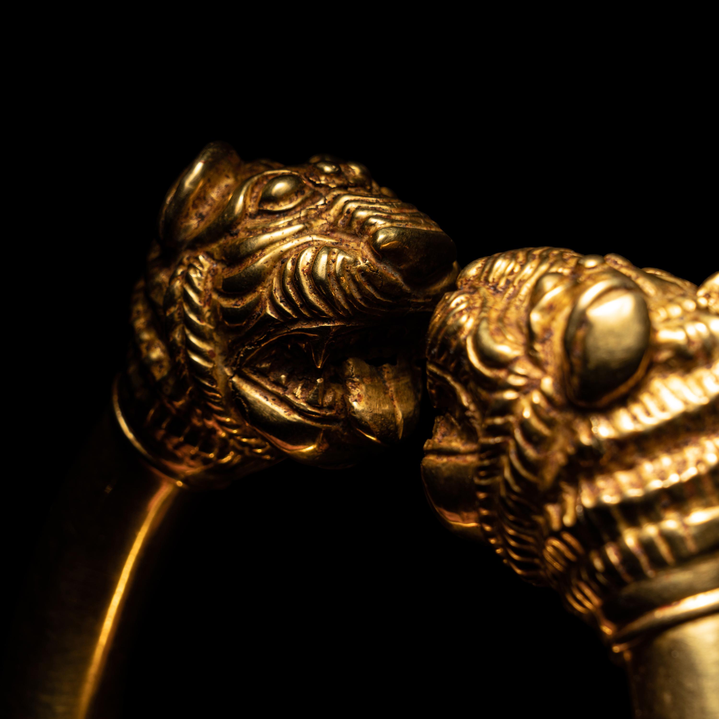 A Western Asiatic Gold Bracelet with Lion-Headed Terminals