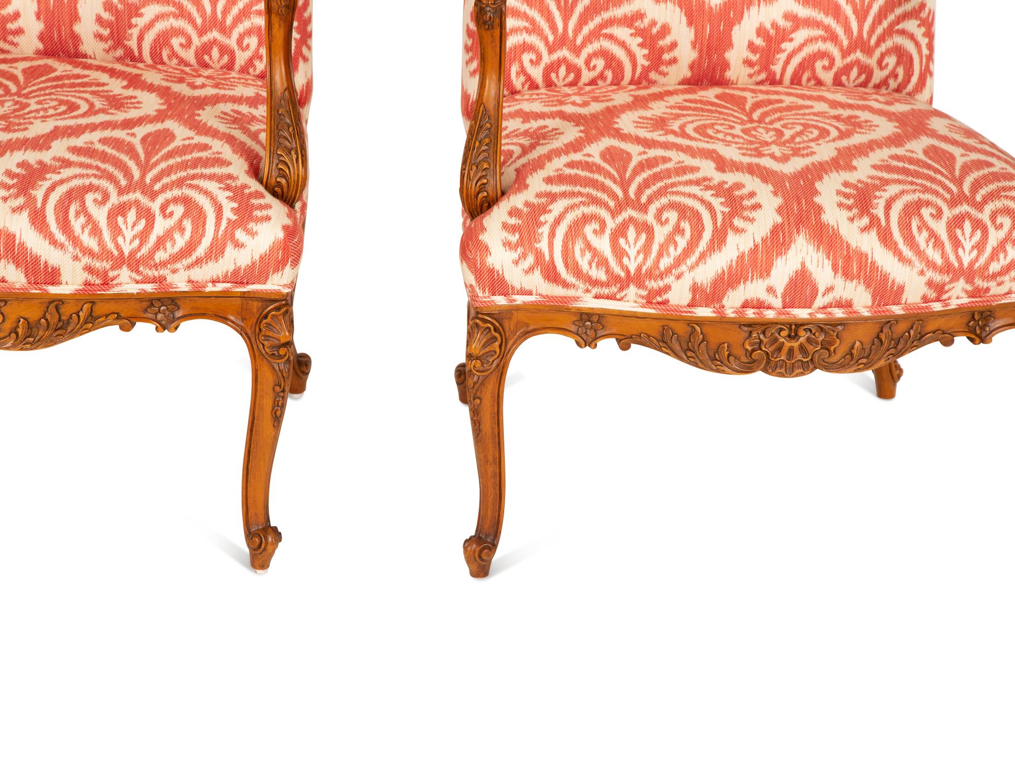 A Pair of Régence Style Walnut Fauteuils