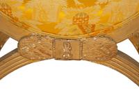 An Italian Giltwood Curule-Form Bench