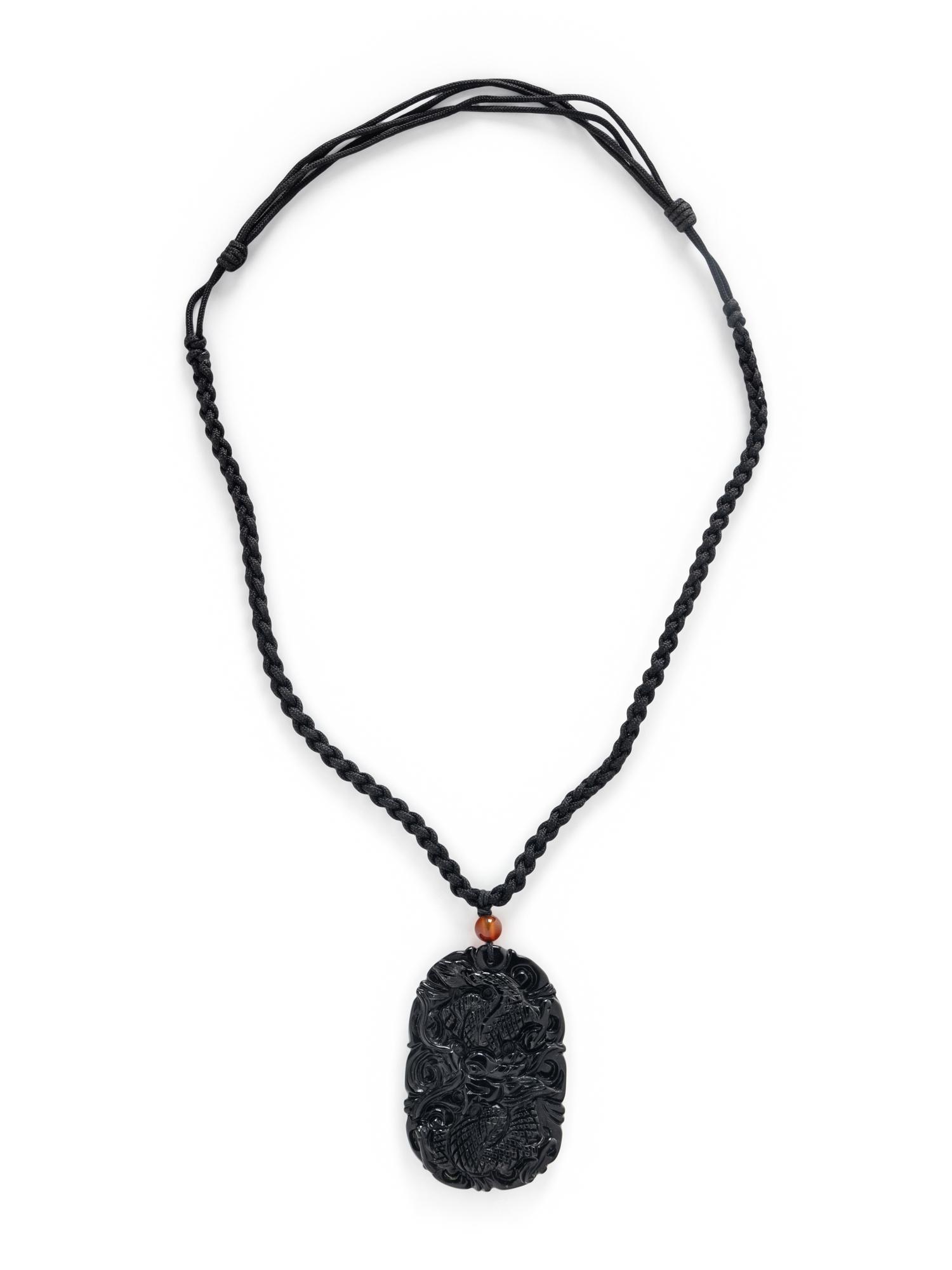 CARVED BLACK JADE PENDANT