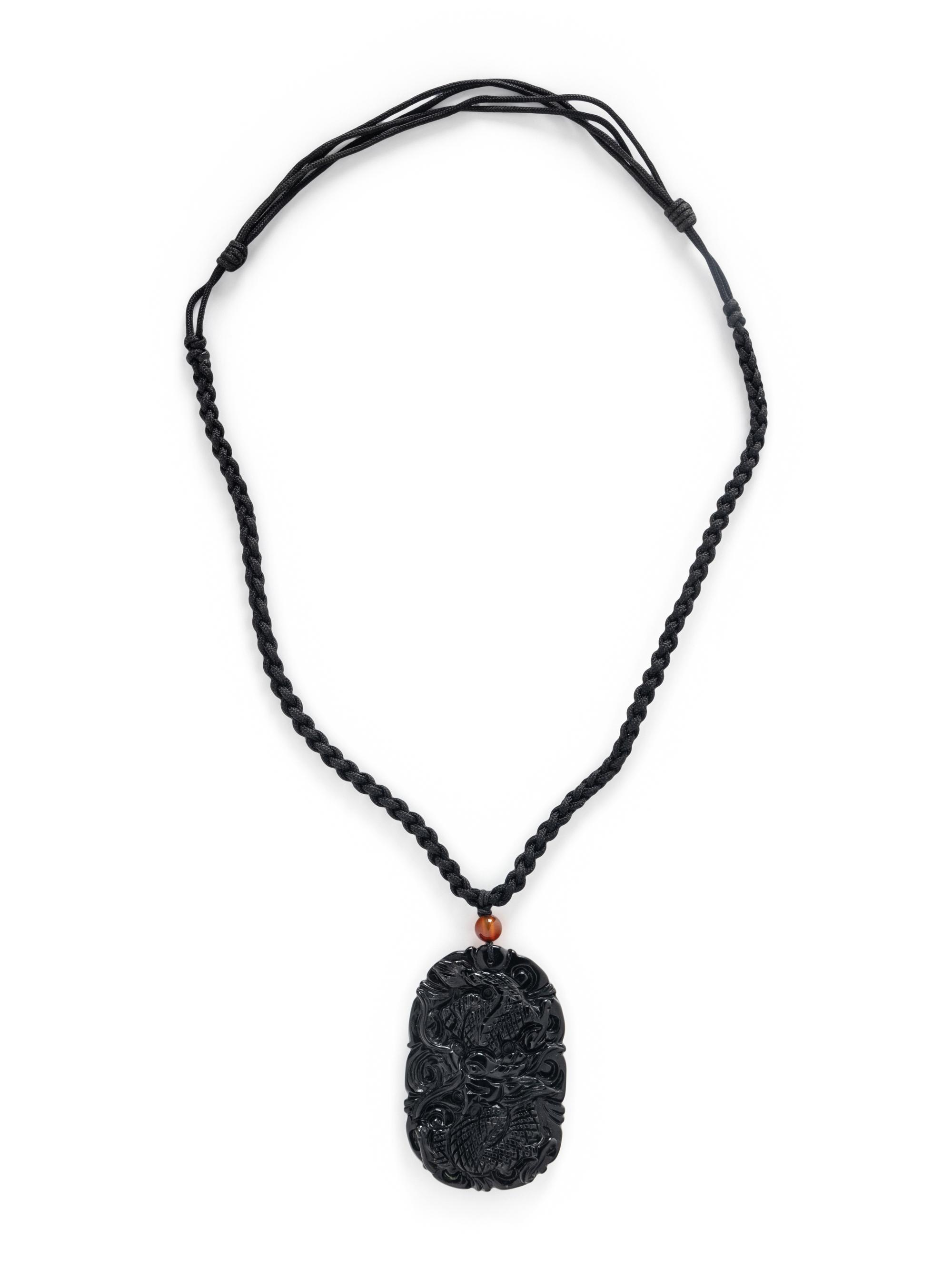 CARVED BLACK JADE PENDANT